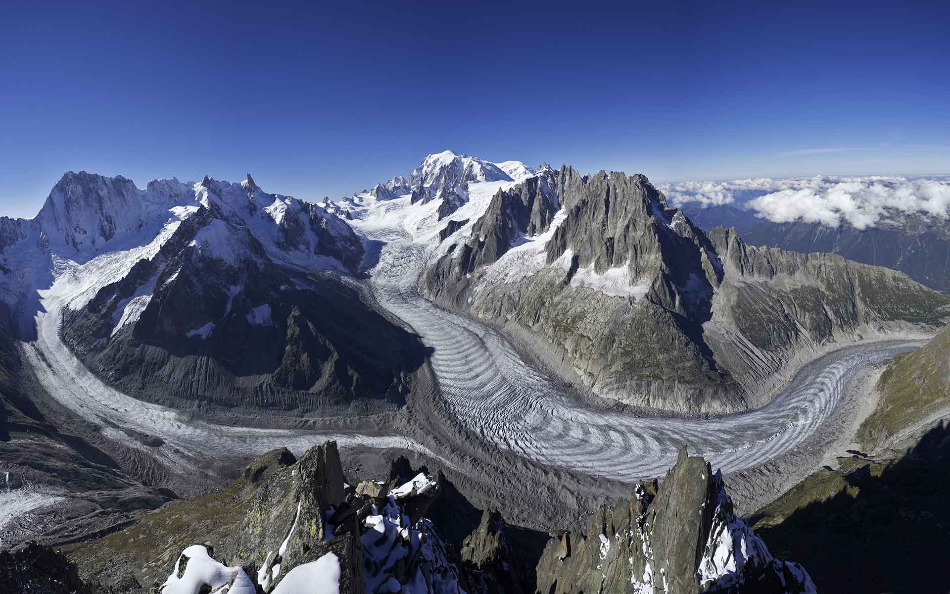 Mer de Glace, with Mont Blanc summit in the background. The supraglacial debris now completely covers the last two kilometers (Photo: J.-F. Hagenmuller).