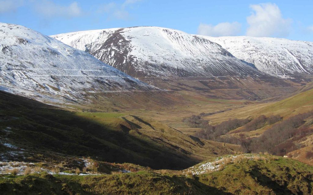 Classic view of the Parallel Roads of Glen Roy looking northwards from the Viewpoint area. The shorelines are at altitudes of 260m, 325m and 350m. (Photo: CC by 3.0 - Richard Crowest https://commons.wikimedia.org/wiki/File:Parallel_Roads.JPG).