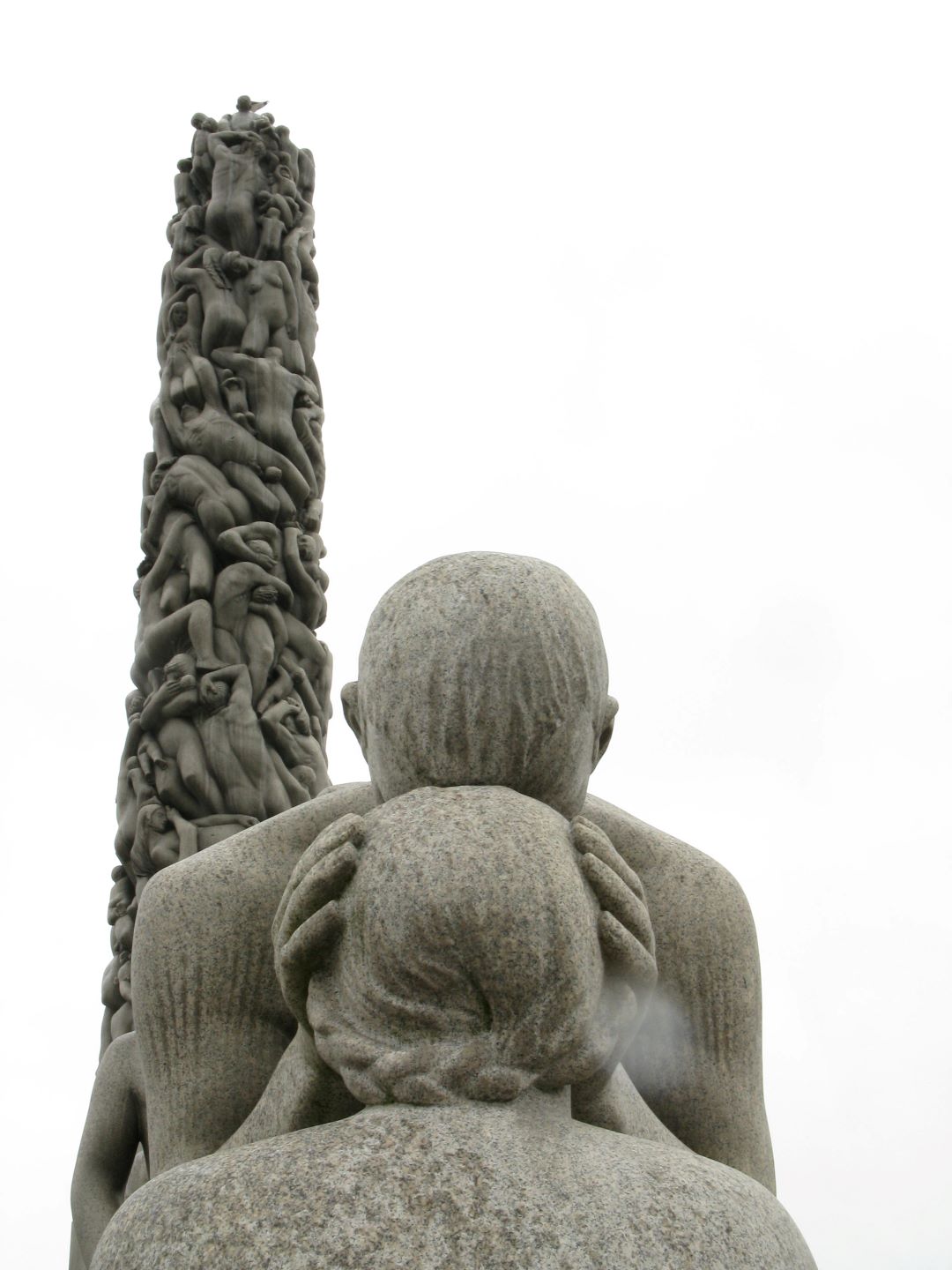 From the Vigeland sculpture park, Oslo. The Monolith in the background. (photo Tom Heldal).